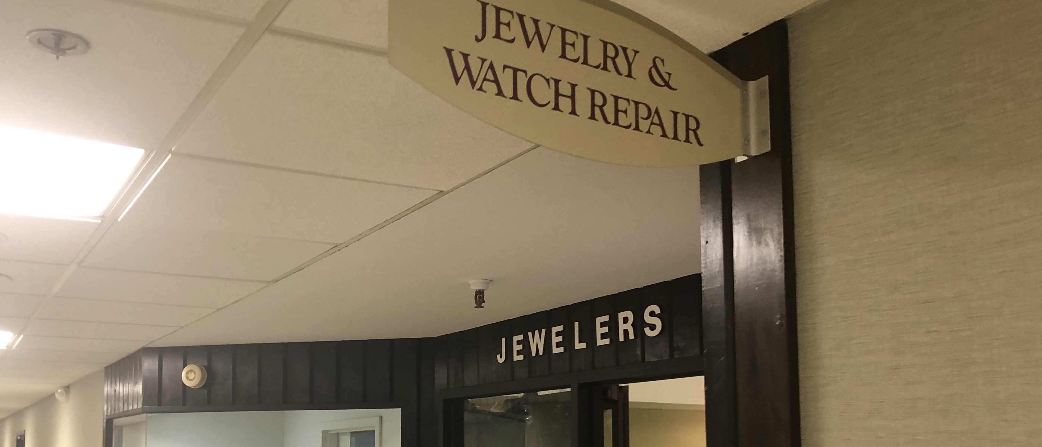 photo of the front of a watch & jewelry repair shop